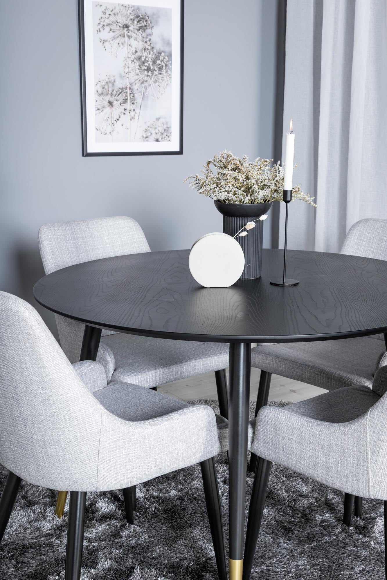 Modernes Dipp Esszimmerset mit runden Tisch und eleganten Stühlen für gemütliche Abende und stilvolle Brunches. Ideal für Ihr Zuhause!