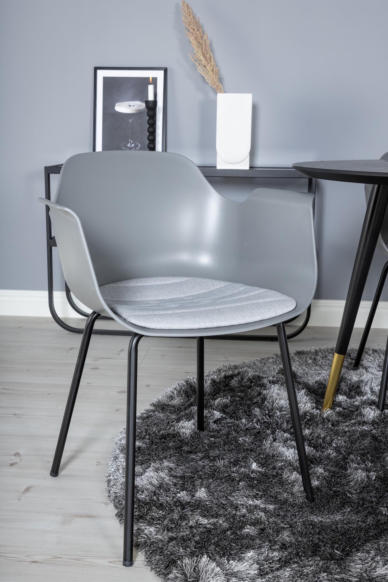 Modernes Dipp Esszimmerset von Venture Home: runder Tisch für 4 Personen, pflegeleichte Tischplatte, ergonomische Stühle für höchsten Komfort.