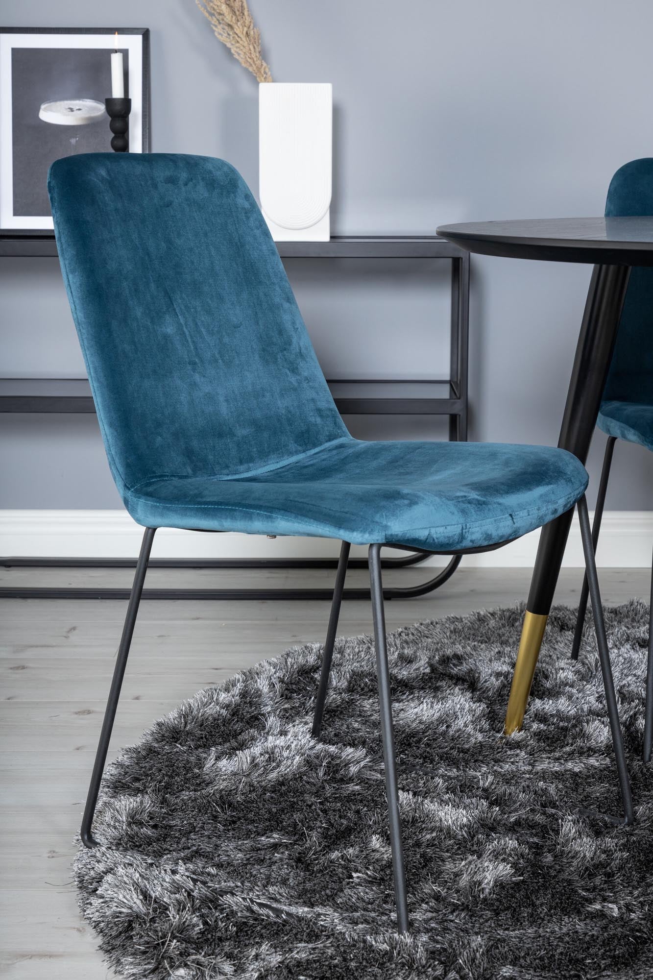 Elegantes Dipp Esszimmerset mit Samt-Stühlen und rundem Tisch, ideal für gesellige Abende und stilvolle Essbereiche.