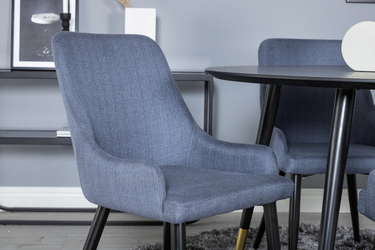Rundes Esszimmerset von Venture Home: schwarzer MDF-Tisch mit Stahlbeinen und zwei blaue Stühle mit schwarzem Stahlgestell.