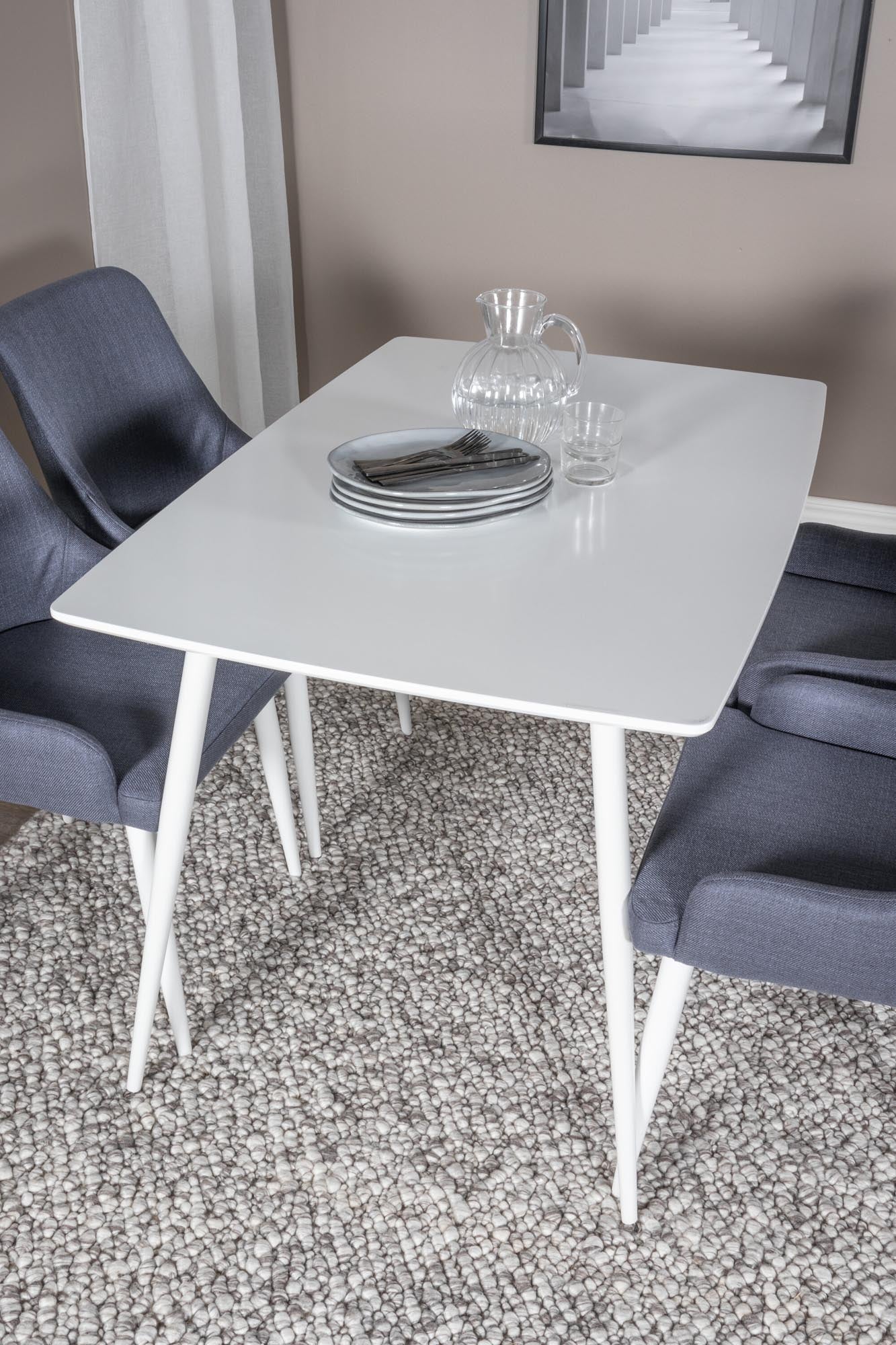 Elegantes Polar Esszimmerset: Zeitloses Design für stilvolle Räume.