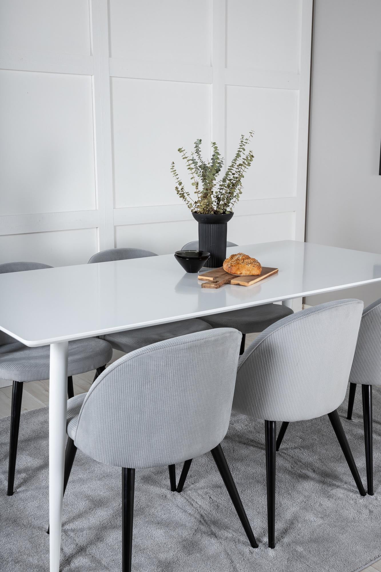 Modernes Polar Esszimmerset 180cm mit 6 bequemen Samtstühlen.