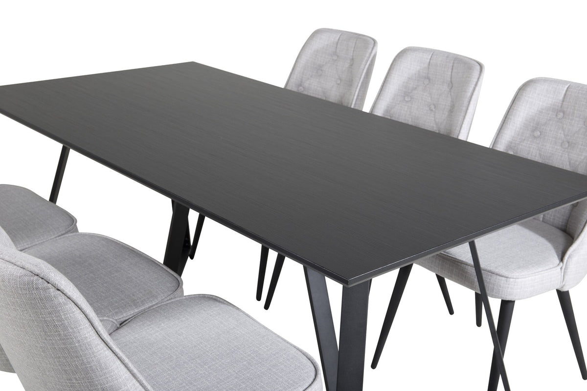 Esszimmerset von Venture Home: rechteckiger Esstisch mit schwarzer MDF-Platte und Stahlgestell, zwei graue Samt-Stühle mit gepolstertem Sitz.