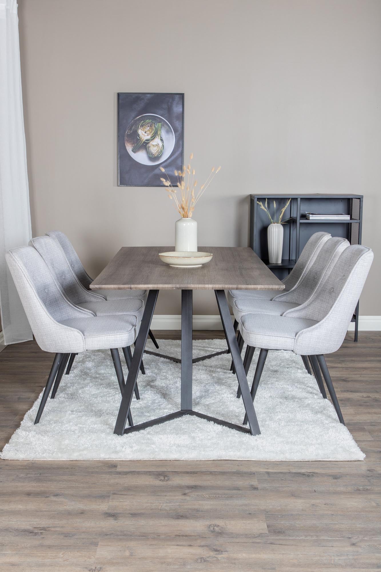 Modernes Marina Esszimmerset Velvet 180cm für 6 Personen. Pflegeleichter Tisch und luxuriöse Stühle mit strapazierfähigem Polyesterbezug.