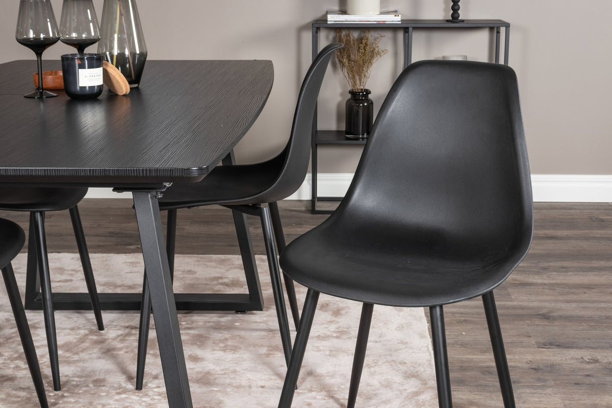 Schwarzes Inca Esszimmerset von Venture Home: ausziehbarer Tisch aus MDF, Sperrholz und Stahl mit sechs passenden Stühlen der Serie Polar