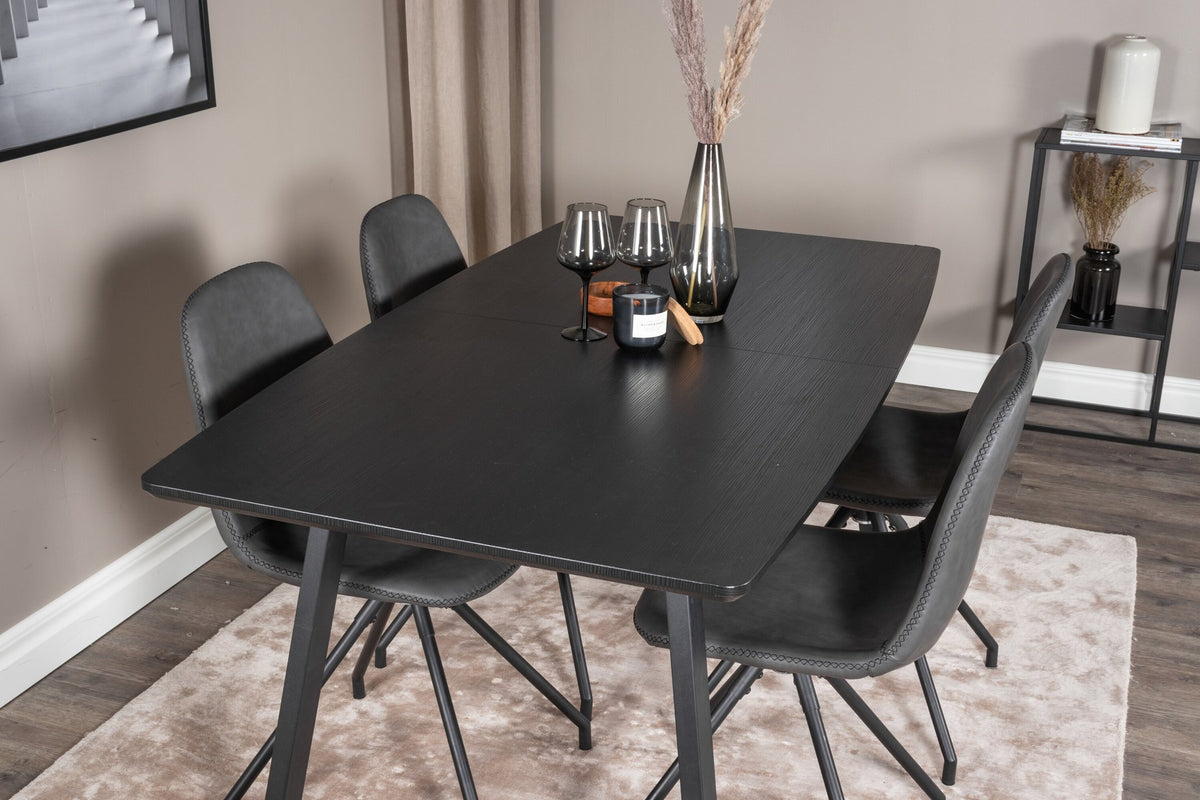 Schwarzes Inca Esszimmerset von Venture Home: ausziehbarer Tisch aus MDF, Sperrholz und Stahl mit sechs passenden Stühlen der Serie Polar