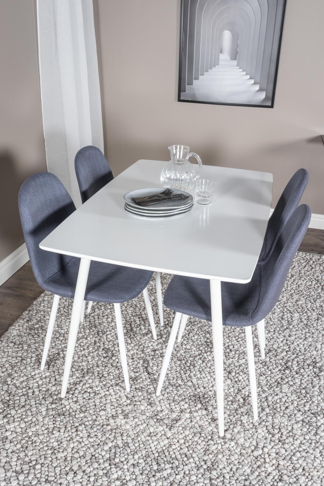 Gestalten Sie Ihr Esszimmer mit dem eleganten Polar Esszimmerset von Venture Home: Ein 120 cm großer Tisch und 4 ergonomische Stühle aus strapazierfähigem Polyester.