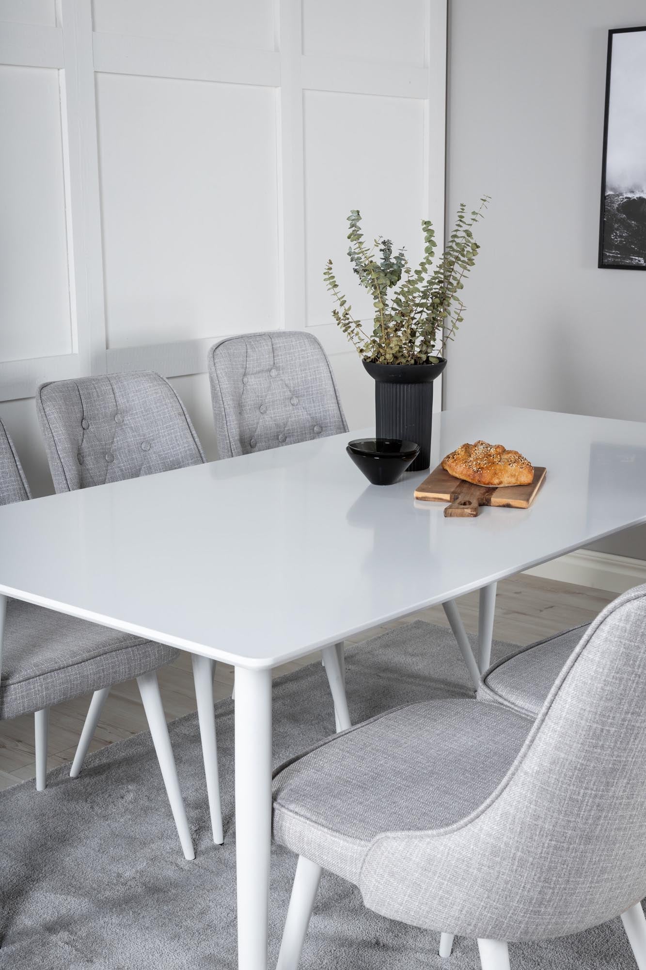 Elegantes Esszimmerset mit 180 cm Tisch und 6 bequemen Velvet-Stühlen. Ideal für stilvolle Dinner und gesellige Abende.