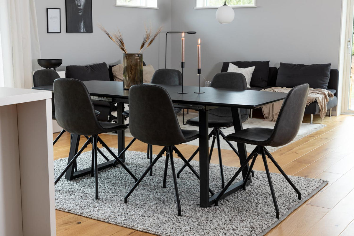 Schwarzes Inca Esszimmerset von Venture Home: ausziehbarer Tisch aus MDF, Sperrholz und Stahl mit sechs passenden Stühlen der Serie Polar