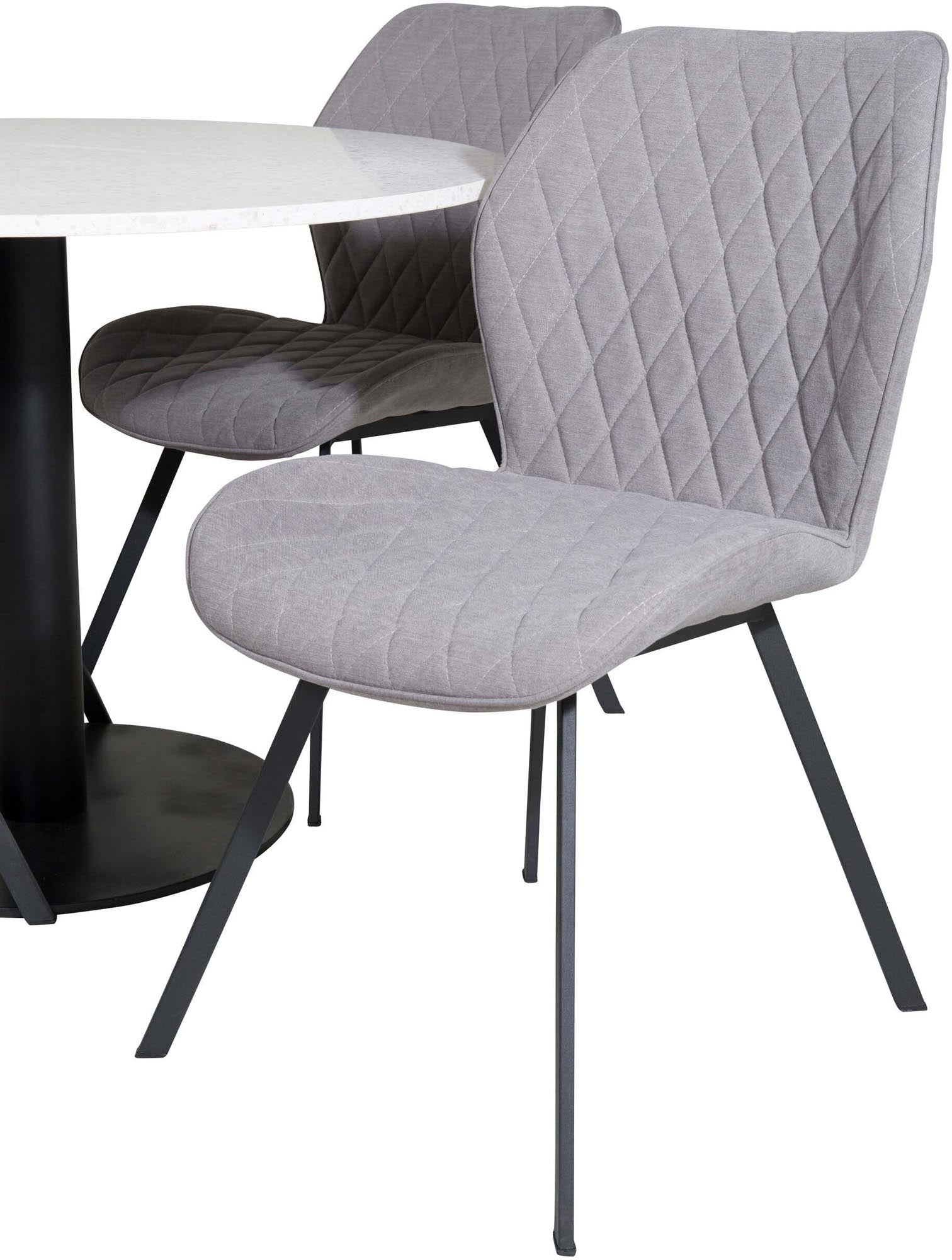 Stilvolles Razzia Esszimmerset mit rundem Tisch (⌀106cm) und ergonomischen Gemma-Stühlen. Perfekt für gemütliche Zusammenkünfte und elegante Dinner.