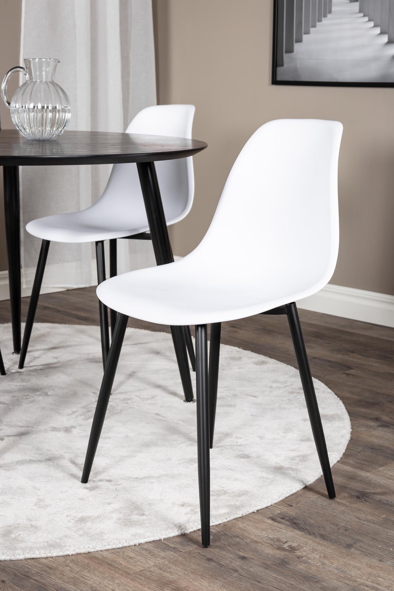 Stilvolles Dipp Esszimmerset von Venture Home: runder Tisch (⌀115 cm) und ergonomische Stühle für gemütliche Abende mit Freunden.