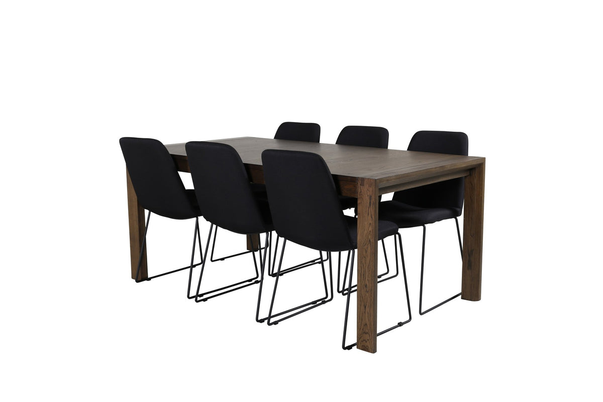 Esszimmerset mit ausziehbarem Eichentisch auf Stahlgestell und sechs schwarzen, gepolsterten Stühlen aus Polyesterstoff mit Metallbeinen.