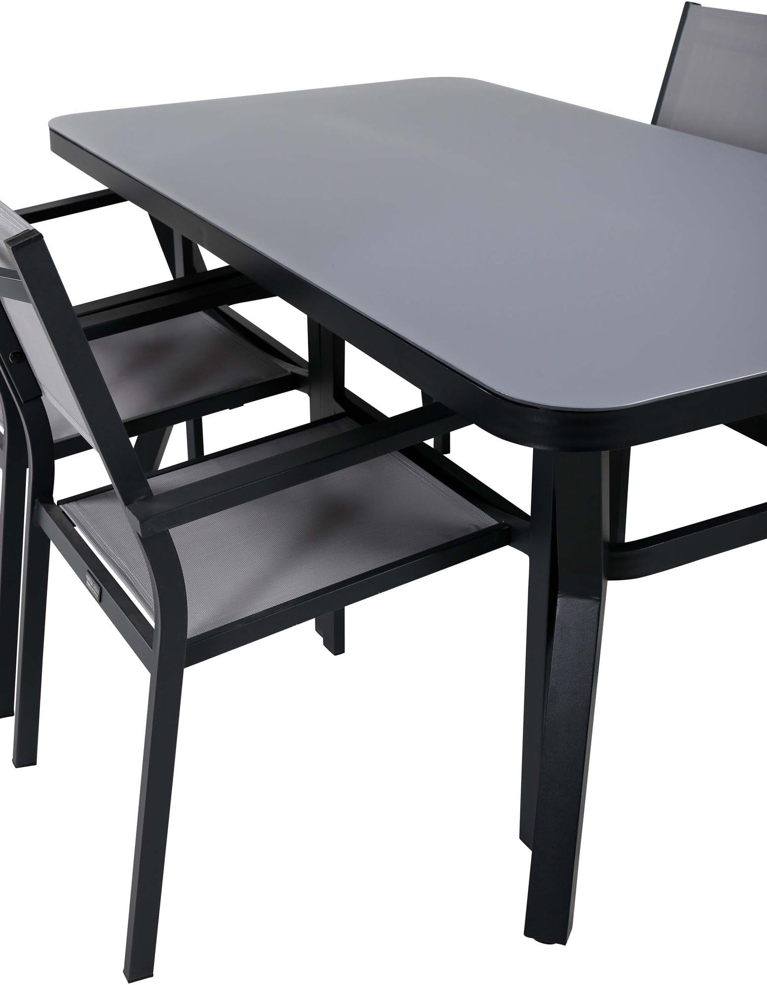 Stylisches Virya Outdoor-Tischset mit 160 cm Tisch und bequemen Copacabana Stühlen. Perfekt für entspannte Stunden im Freien mit Freunden!