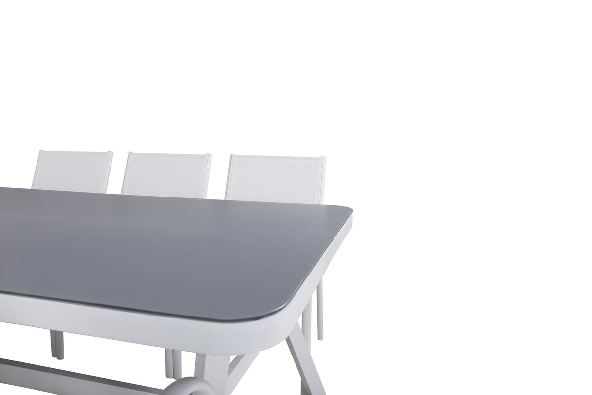 Weisser Esstisch aus Mattglas mit Aluminiumbeinen und zwei weisse Santorini Stühle aus Textilene, rechteckige Tischplatte 200x100 cm.