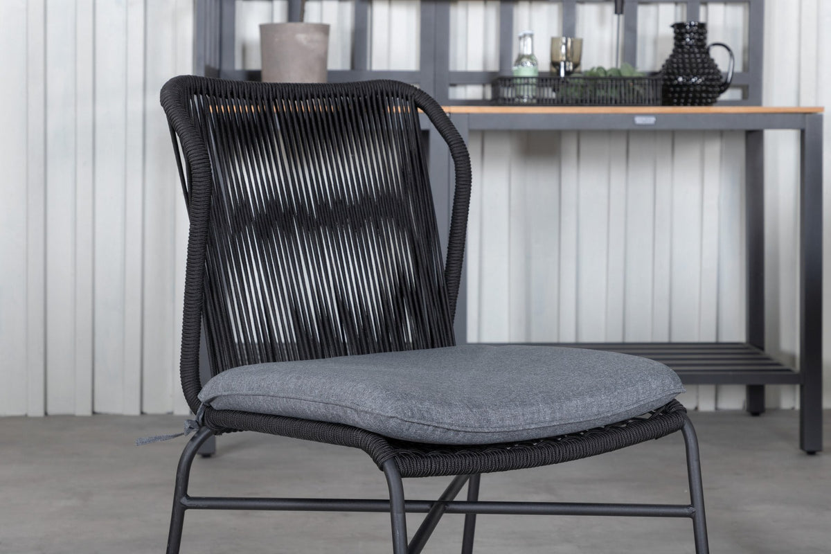 Schwarzes Gartentischset aus Aluminium und Teak: rechteckiger Esstisch 152x90 cm mit 4 Stühlen mit Polyesterbezug.