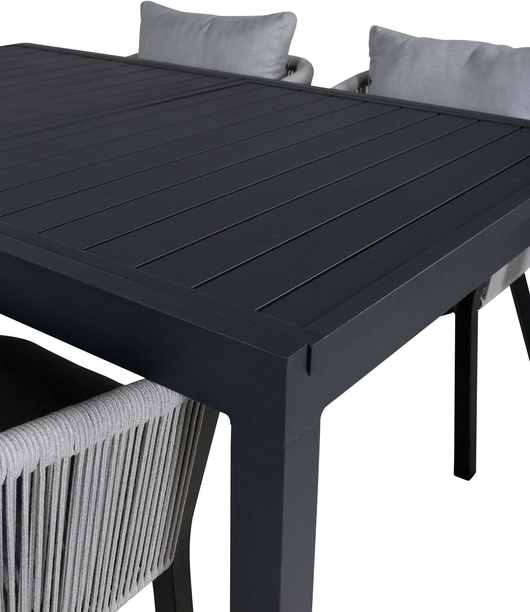 Elegantes, erweiterbares Tischset für stilvolle Gartenmomente.