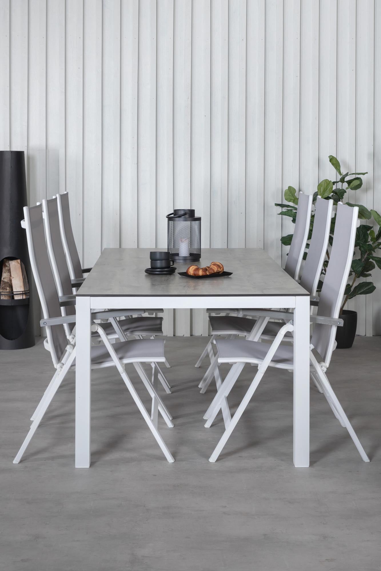 Verleihen Sie Ihrem Außenbereich mit dem Llama Outdoor-Tischset + Albany 205cm/6St. von Venture Home einen Hauch von Eleganz. Ideal für gesellige Zusammenkünfte!