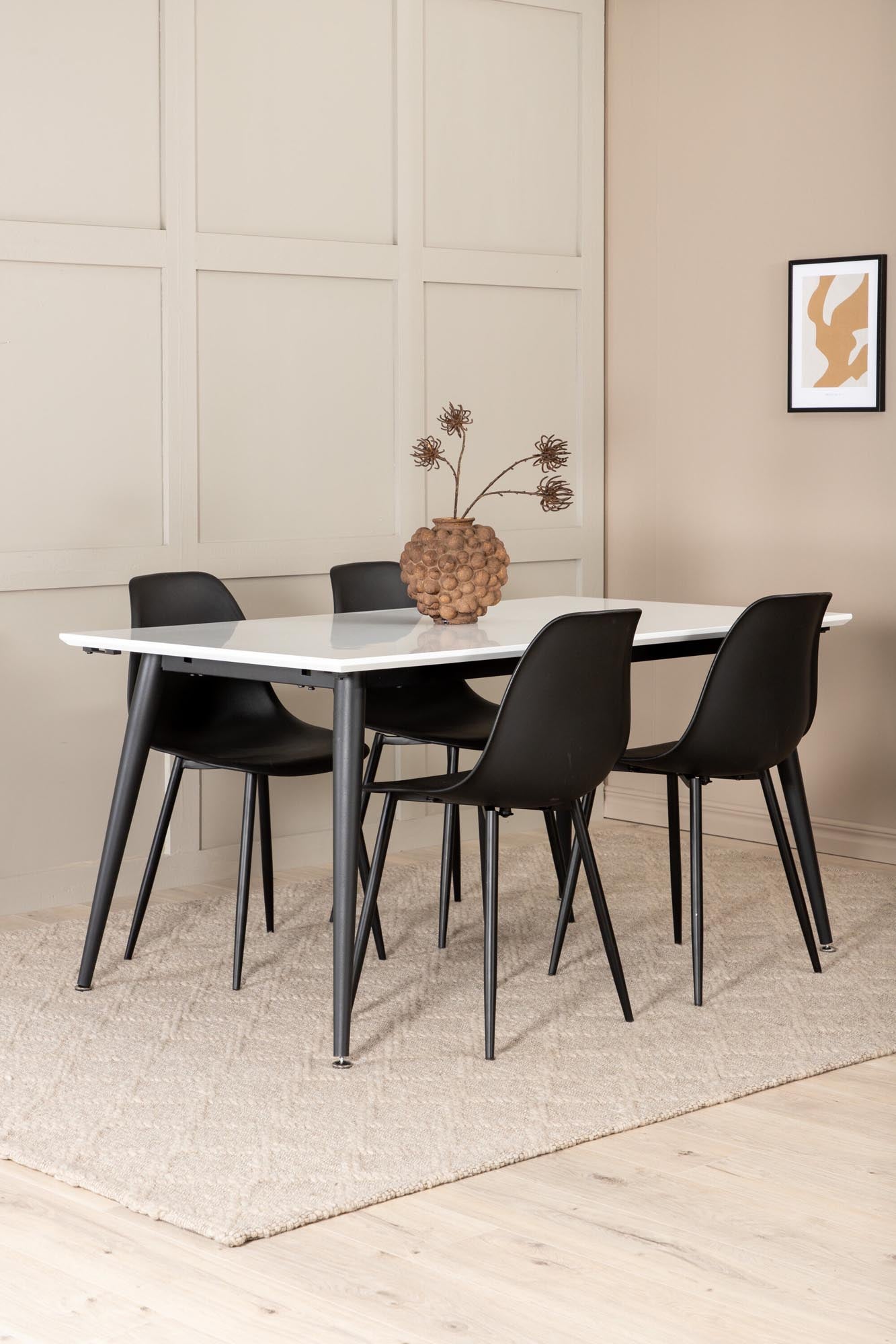 Entdecken Sie das elegante Jimmy Esszimmerset von Venture Home: Ausziehbarer Tisch und komfortable Polar-Stühle für stilvolle Esszimmermomente.