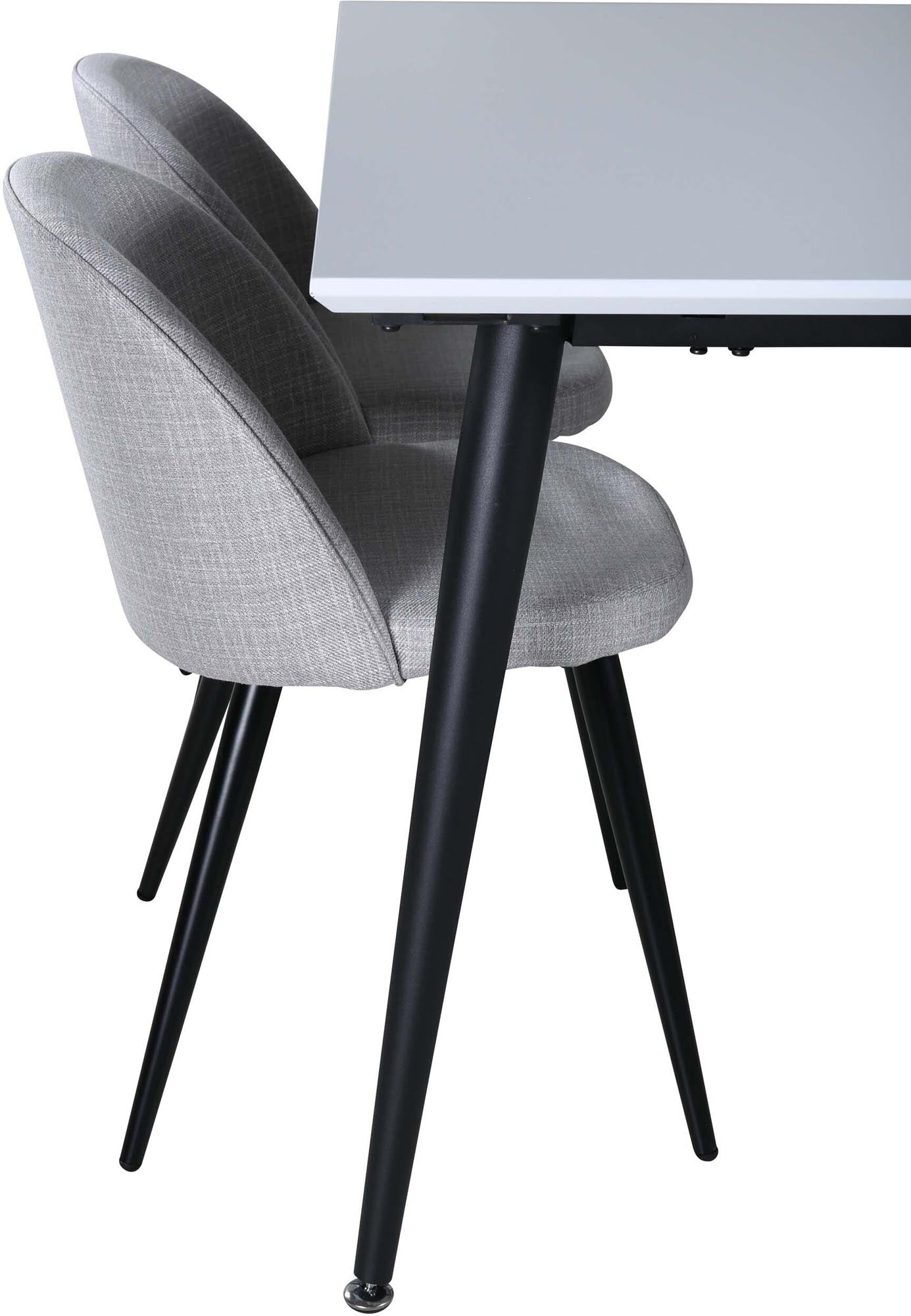 Entdecken Sie das Jimmy Esszimmerset von Venture Home: Ein ausziehbarer Tisch (150-240 cm) und 4 stilvolle Velvet-Stühle für Ihr modernes Esszimmer.