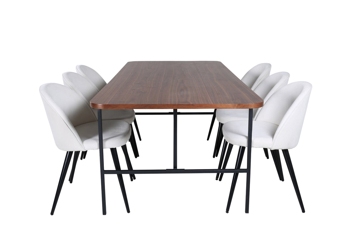 Rechteckiger Esstisch mit Nussbaum-MDF-Platte und Stahlgestell, kombiniert mit Esszimmerstühlen mit Creme Polyester-Cord-Bezug und Stahlbeinen.