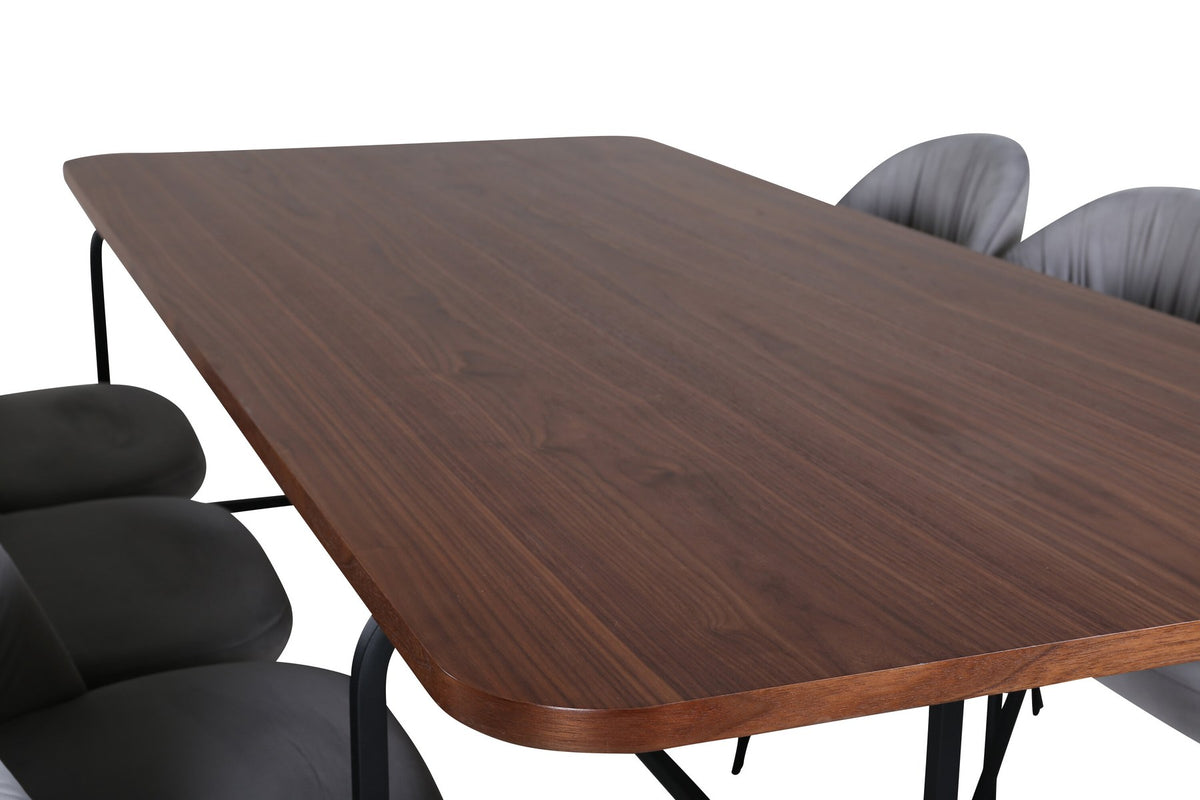 Esszimmerset Uno mit rechteckigem MDF-Tisch in Nussbaum-Furnier und schwarzem Stahlgestell, sechs Wrinkles Stühle mit grauem Samtbezug.