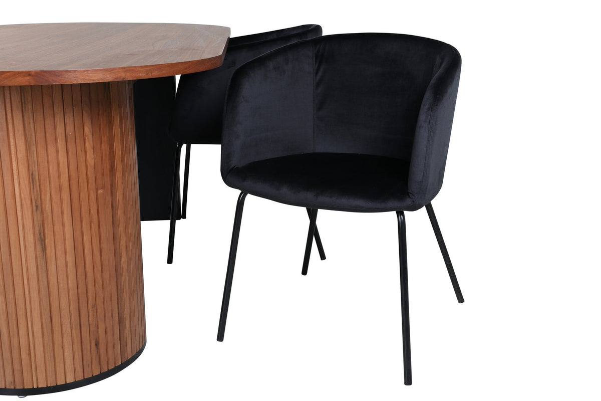 Ovaler Esstisch aus Nussbaum-MDF mit Furnier und vier schwarzen Esszimmerstühlen mit Samtsitz und schmalen Eisenbeinen von Venture Home.