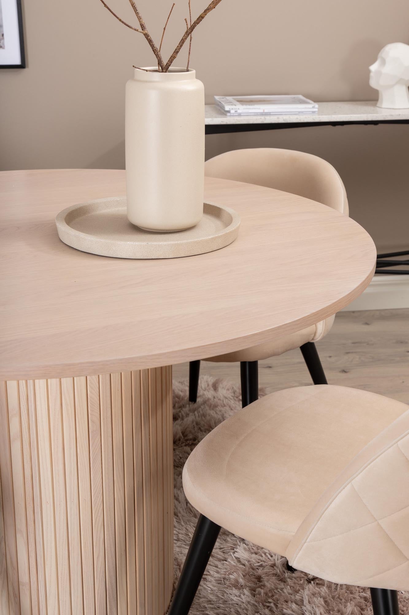 Elegantes Bianca Esszimmerset mit 110 cm Durchmesser. Bequeme Stühle aus pflegeleichtem Polyester-Leinen für gesellige Runden.