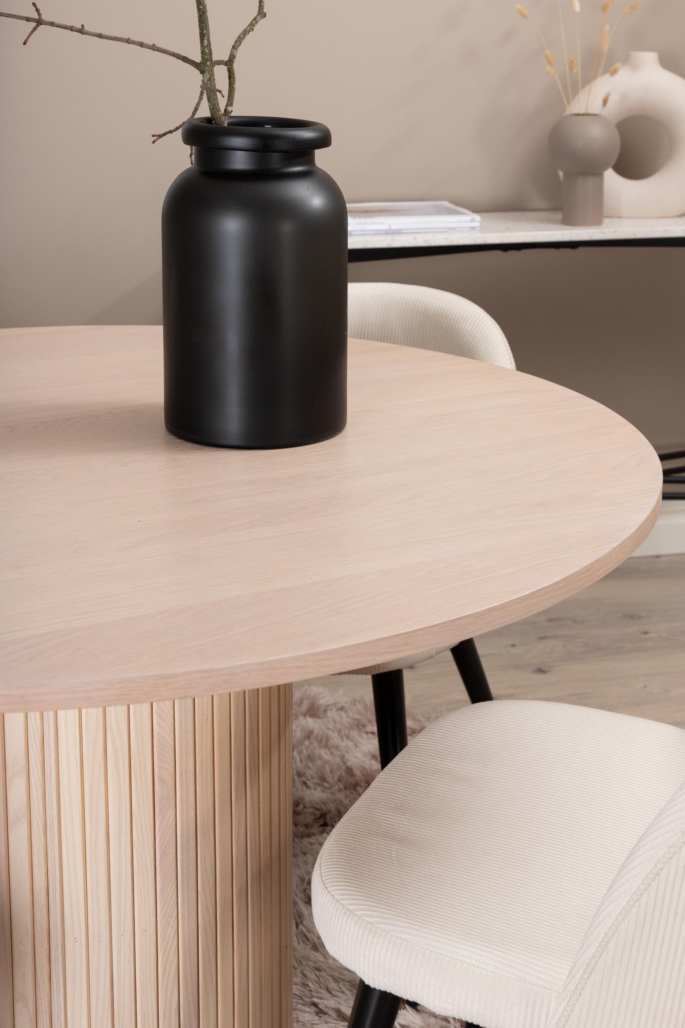 Elegantes Bianca Esszimmerset: Runder Tisch mit 4 Samtstühlen.