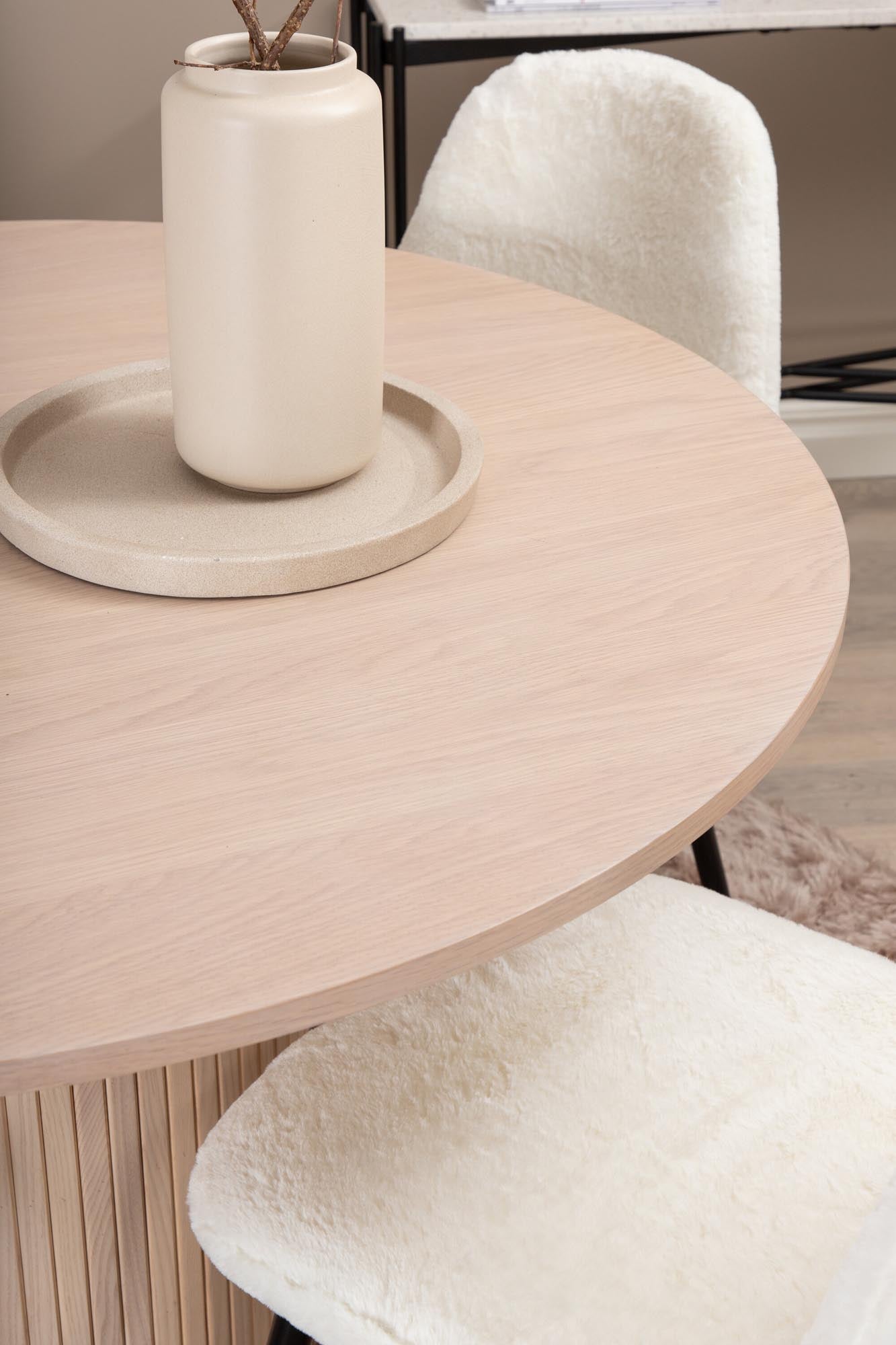 Stilvolles Bianca Esszimmerset mit rundem 110cm Tisch und 4 luxuriösen Samtstühlen. Perfekt für moderne Essbereiche!