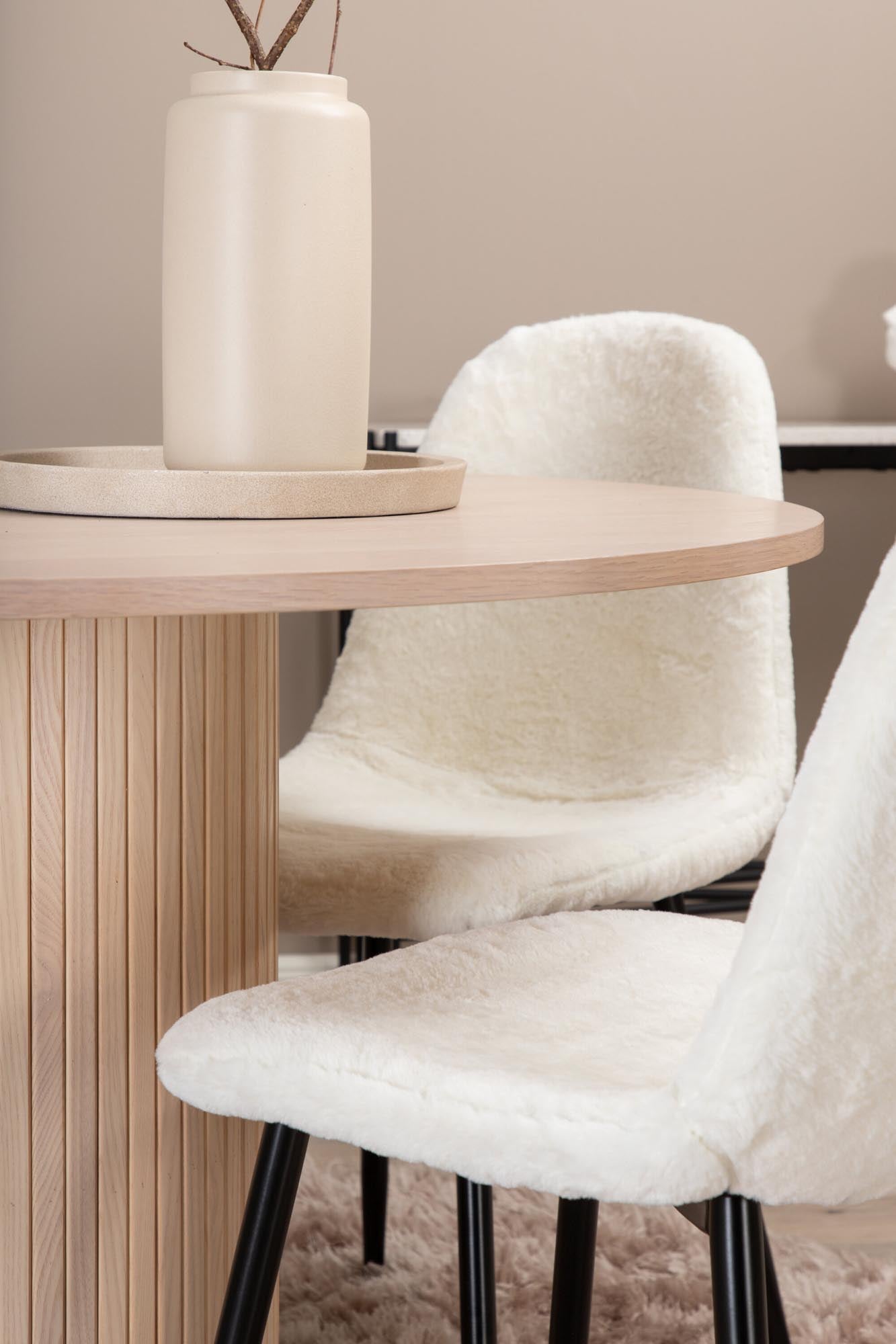 Stilvolles Bianca Esszimmerset mit rundem 110 cm Tisch und 4 luxuriösen Samtstühlen. Perfekt für ein modernes, einladendes Ambiente!