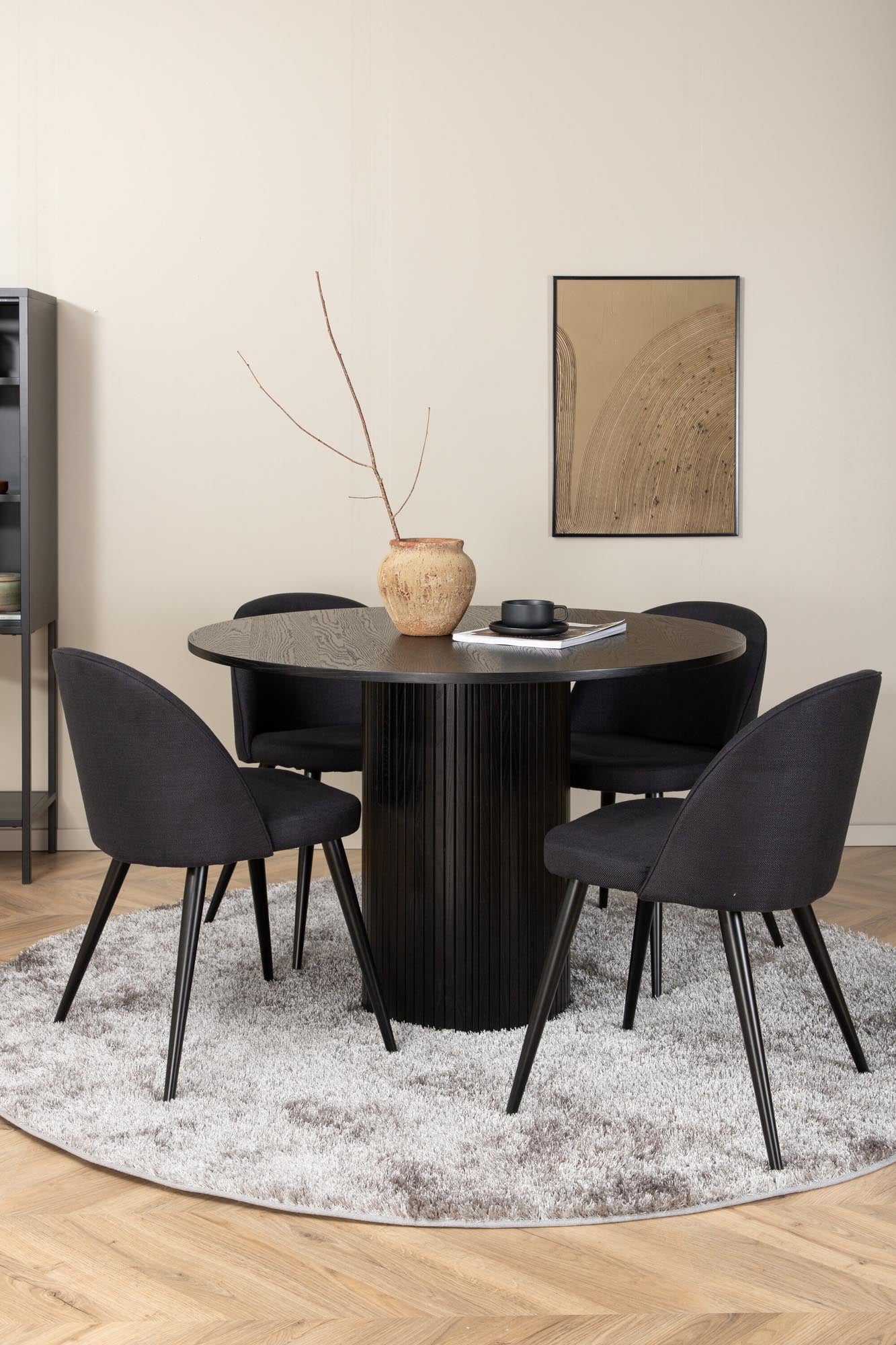 Stilvolles Bianca Esszimmerset: Runder Tisch mit 4 Samtstühlen.