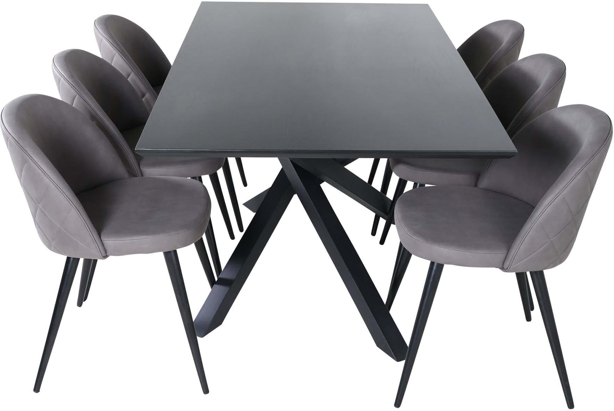 Elegantes Esszimmerset mit samtigen Stühlen für stilvolle Abende.