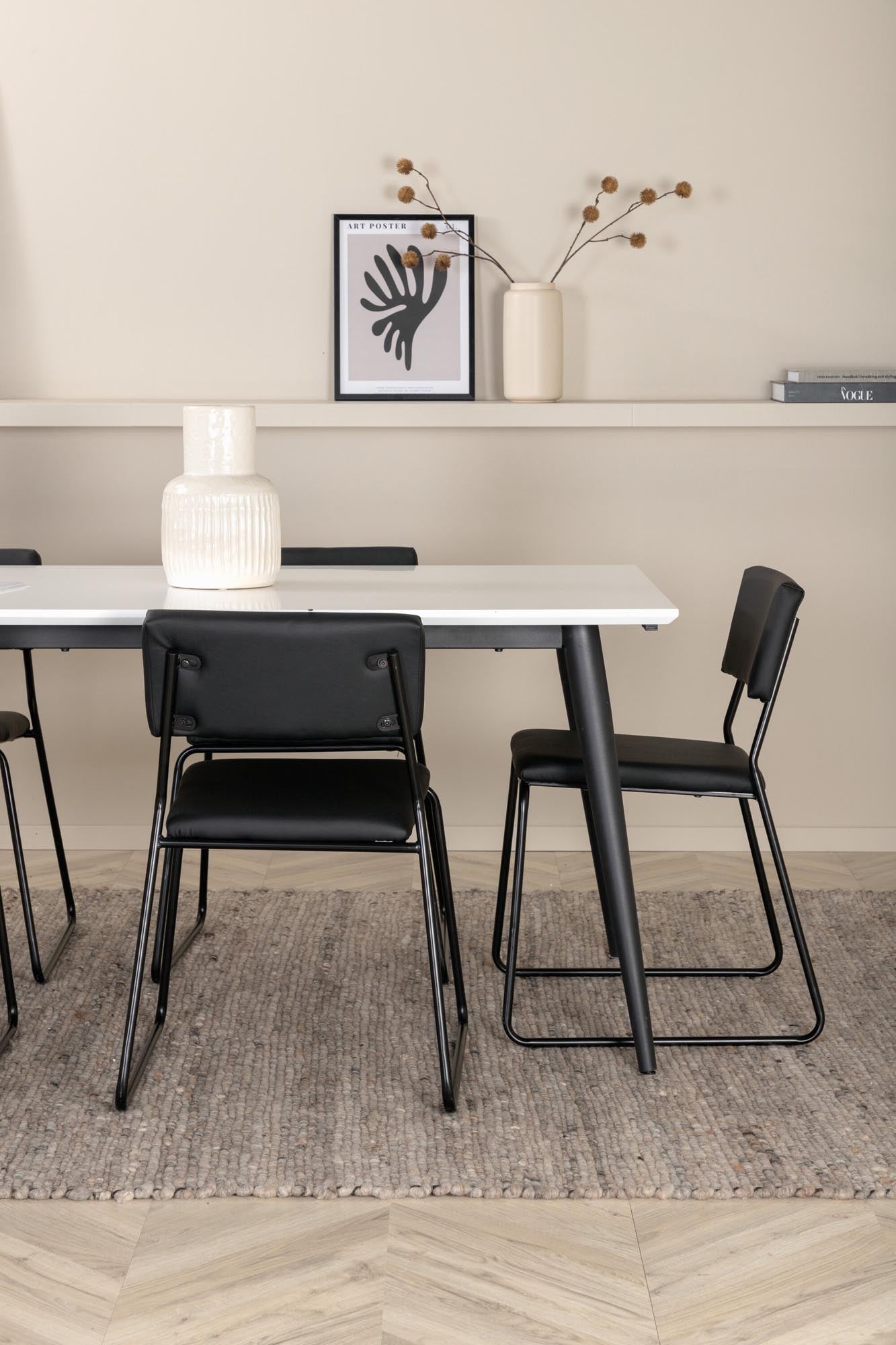 Elegantes Esszimmerset: Ausziehbarer Tisch mit weisser HPL-Platte, 6 komfortable Stühle aus schwarzem Kunstleder. Modern & funktional.