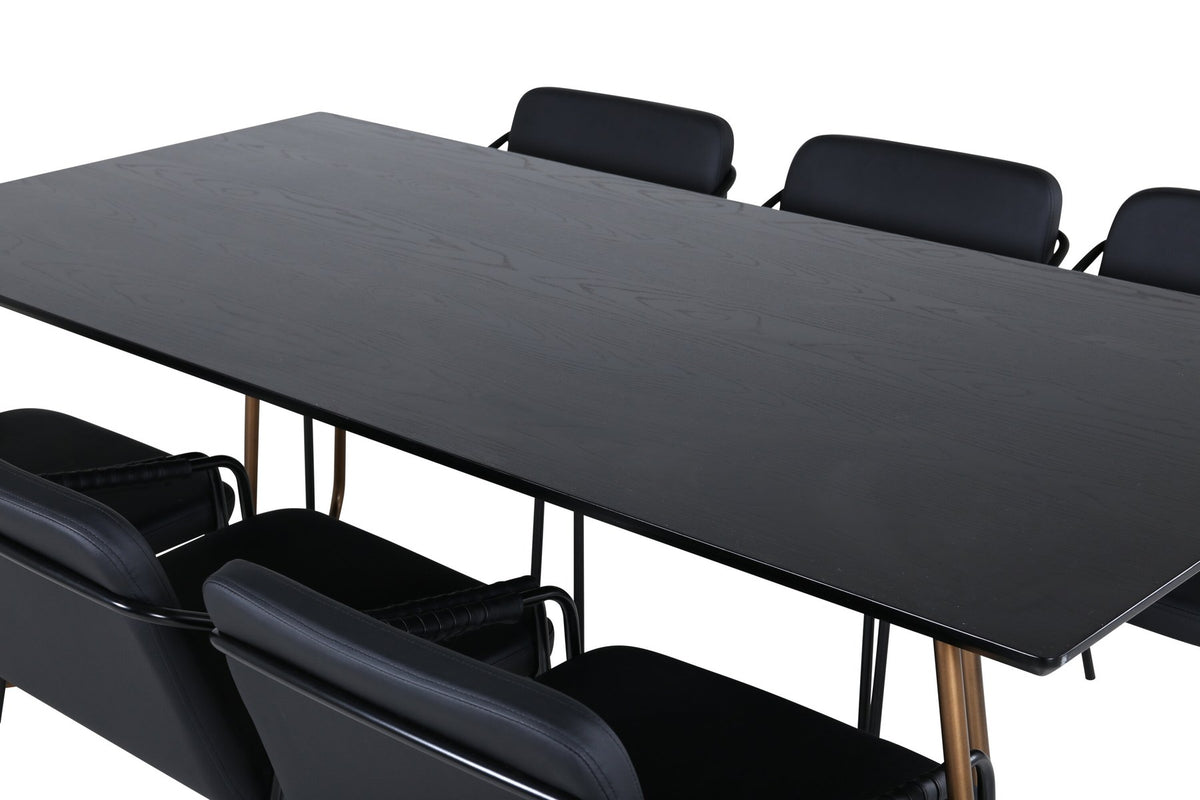 Esszimmerset Petra + Tvist von Venture Home: schwarzer Tisch aus MDF mit Furnier und sechs Stühle mit Kunstleder-Sitzfläche und Eisenbeinen.