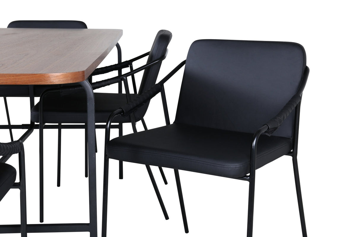 Rechteckiger Esstisch mit Nussbaum-MDF-Platte und schwarzem Stahlgestell, umgeben von schwarzen Tvist Stühlen mit PU-Bezug und Armlehnen