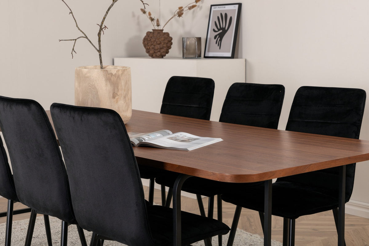 Esszimmerset Uno und Windu von Venture Home: rechteckiger Tisch mit Nussbaum-Tischplatte aus MDF und Furnier, sechs Stühle mit schwarzem Samtbezug