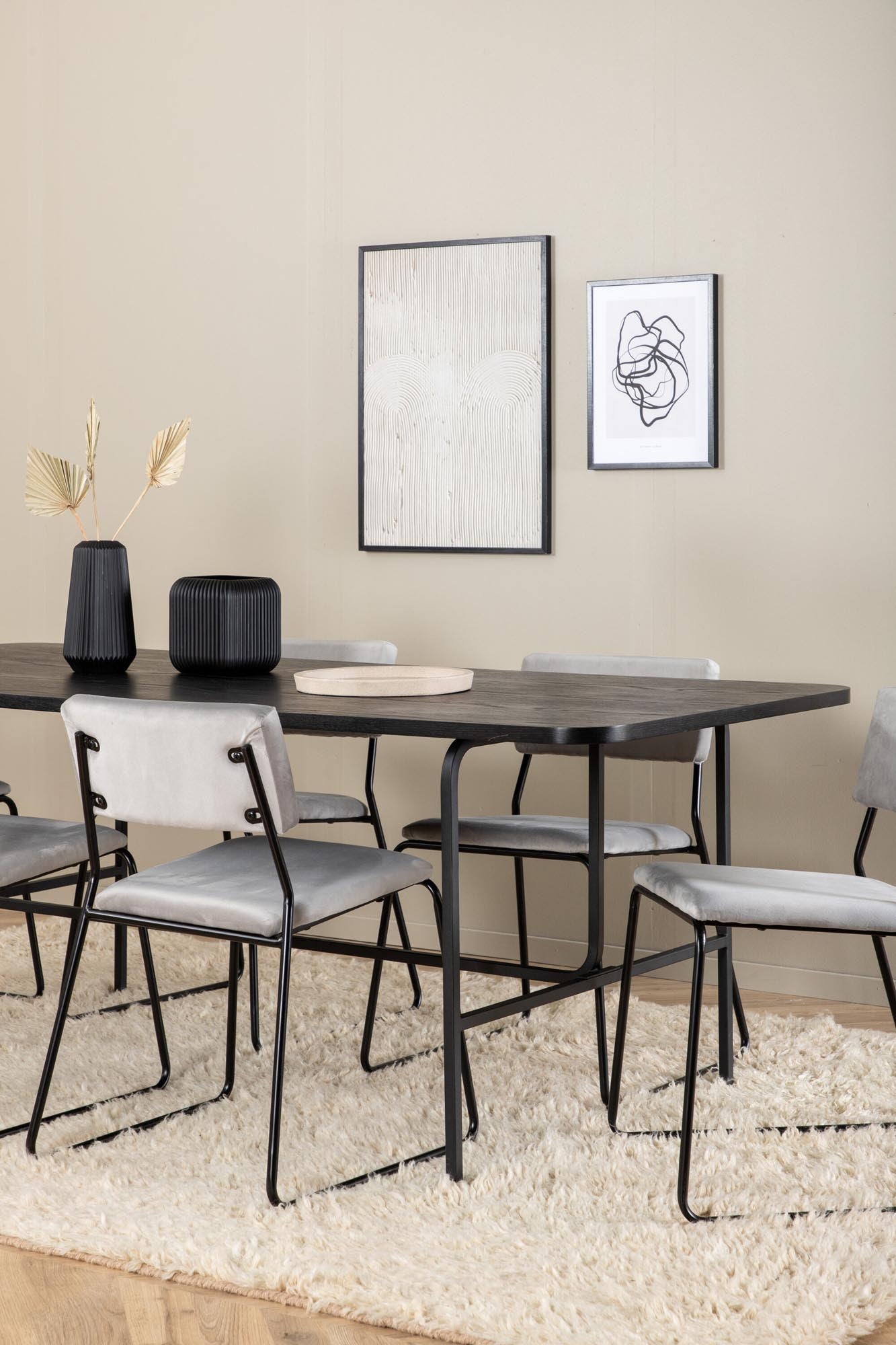 Modernes Esszimmerset von Venture Home: 200 cm Esstisch aus schwarzem MDF und 6 stilvollen Kenth-Stühlen aus grauem Samt für einladende Dinner.