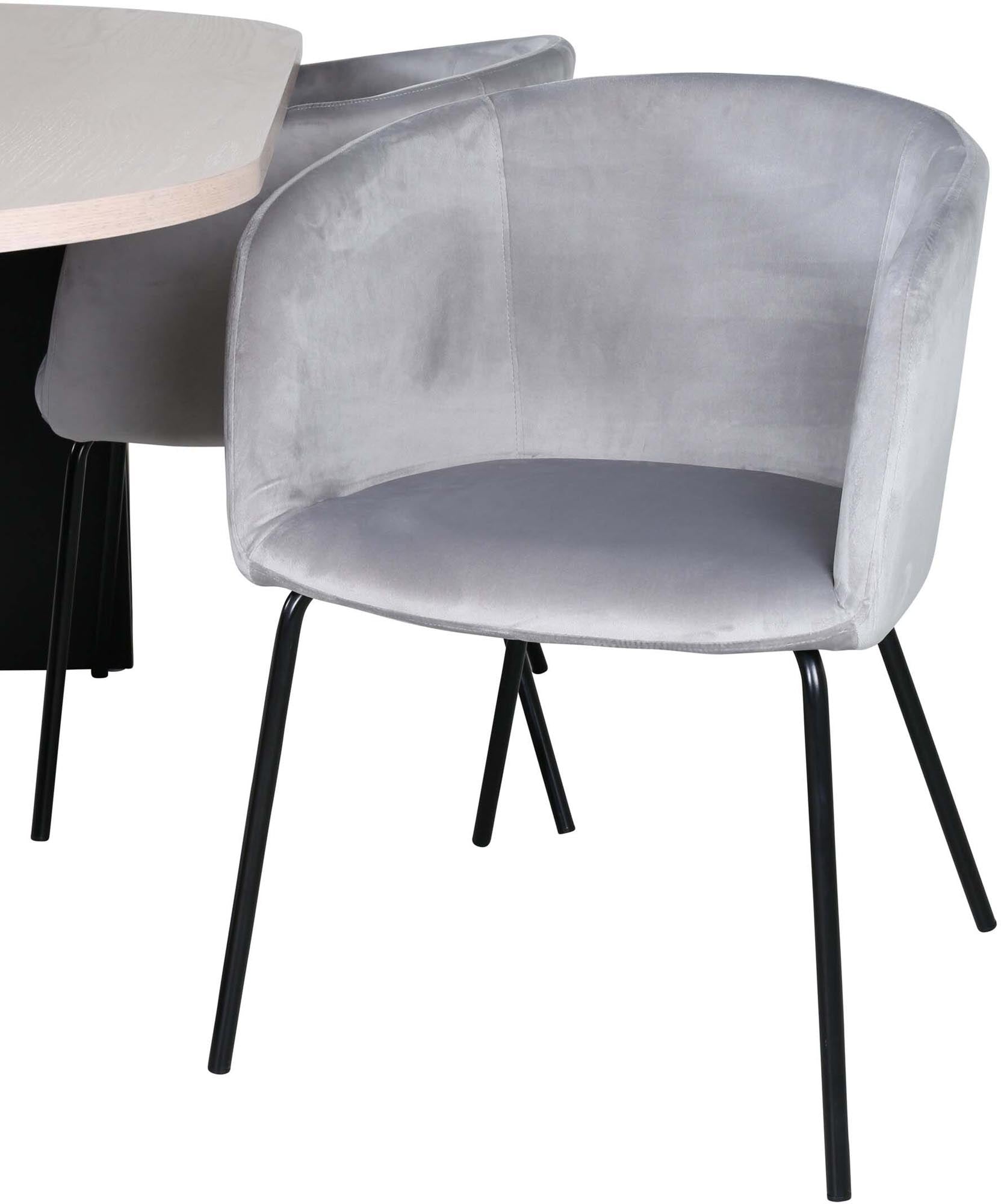 Stilvolles Bianca Esszimmerset mit ovalem Tisch und luxuriösen Samtstühlen. Ideal für gesellige Runden und elegantes Wohnen.