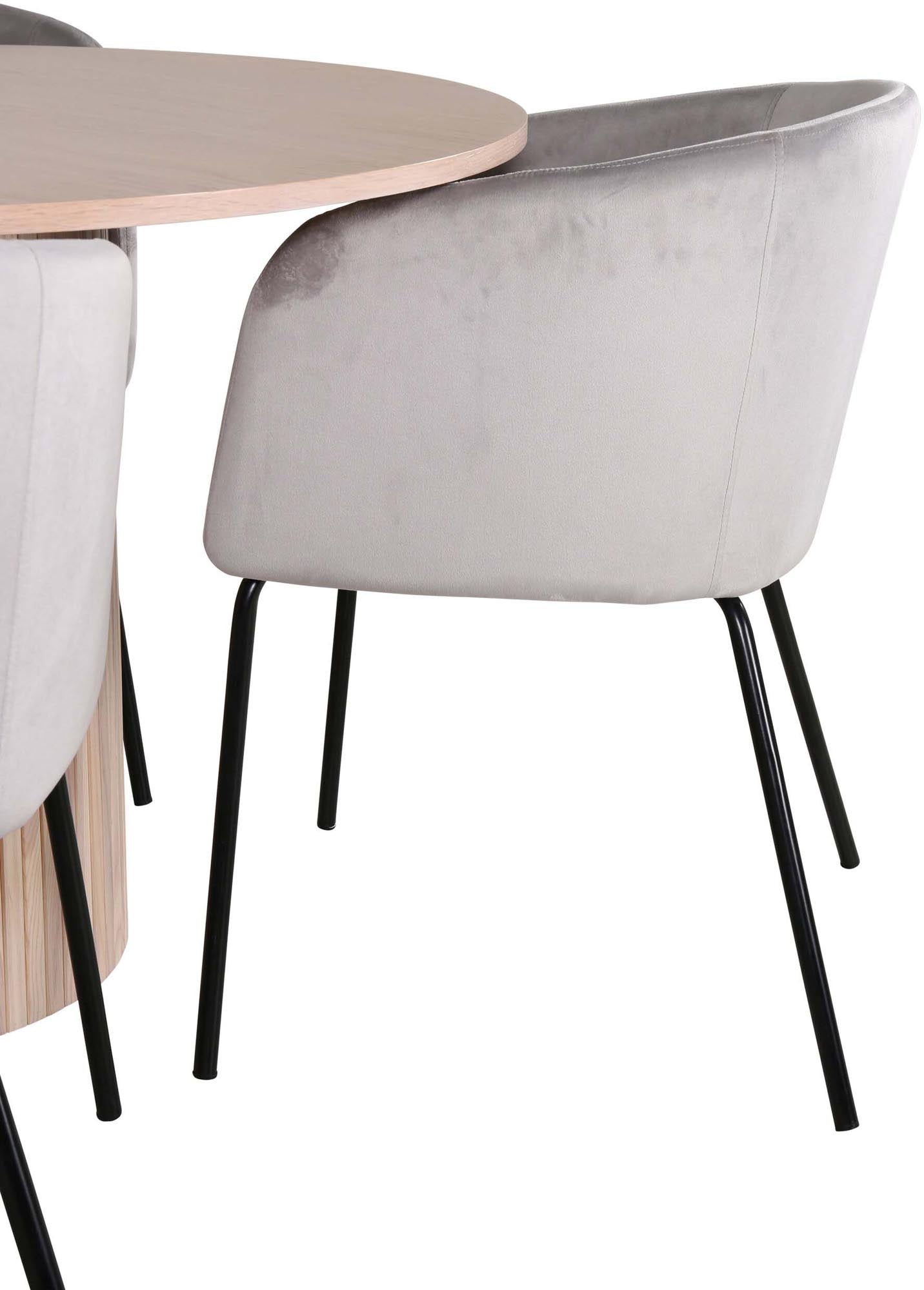 Gestalten Sie Ihr Esszimmer mit dem Bianca Esszimmerset von Venture Home: Moderner runder Tisch und 4 luxuriöse Samt-Stühle für gesellige Abende.