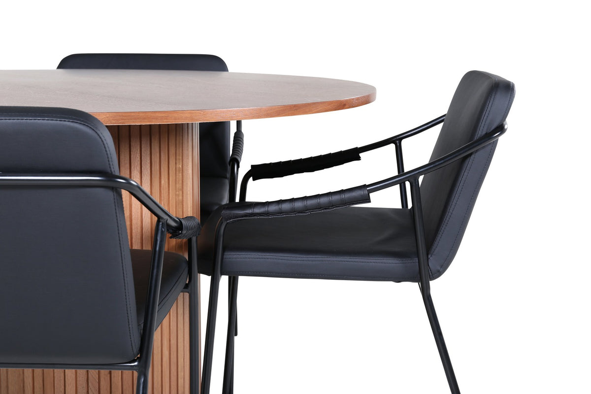 Rundes Esszimmerset mit Tisch aus MDF in Nussbaum-Optik ⌀110 cm und zwei schwarzen Stühlen mit Pulverbeschichtung und Eisenbeinen.