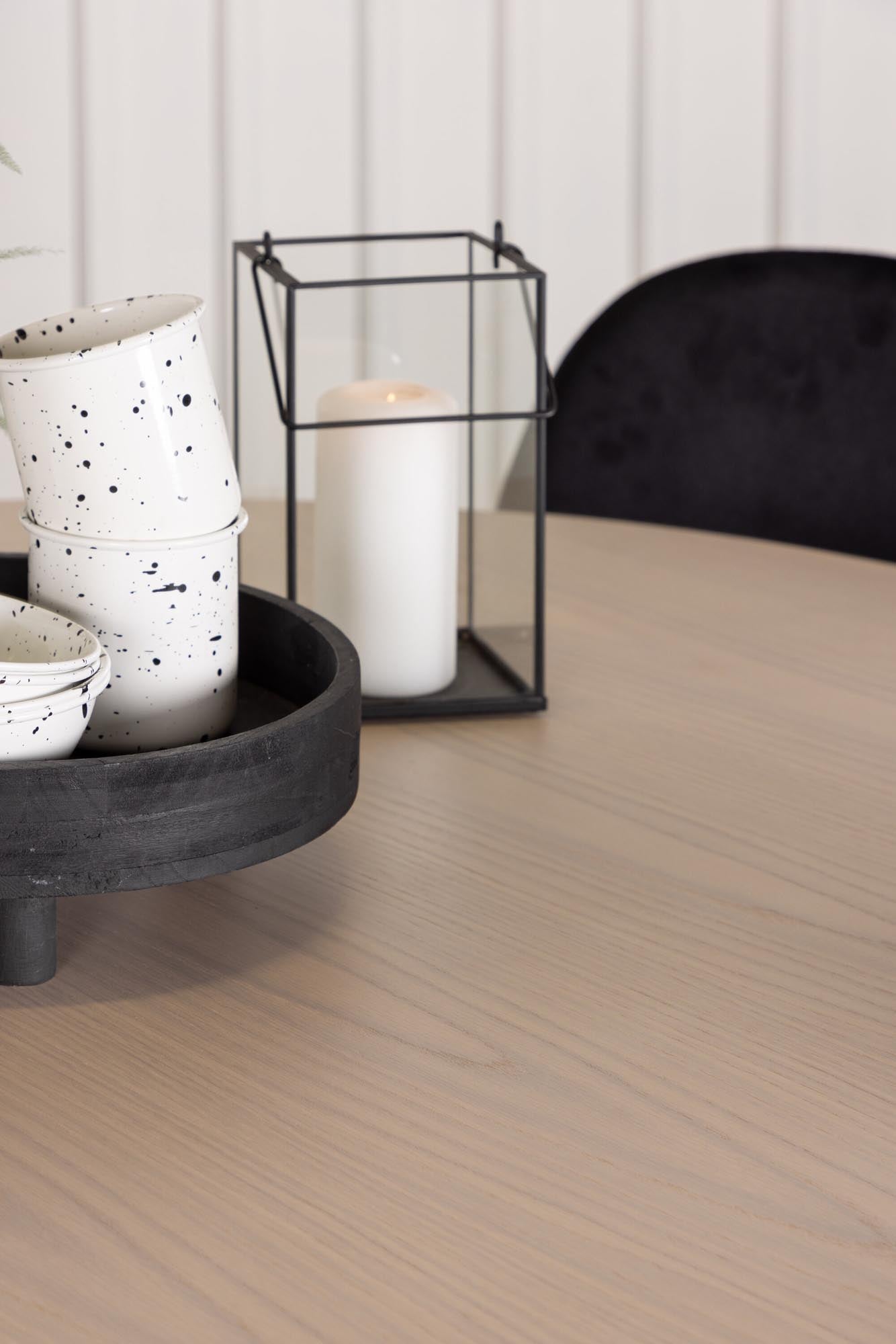 Stilvolles Olivia Esszimmer Set mit skandinavischem Design, runder Tischplatte und 4 bequemen Samt-Stühlen. Perfekt für gesellige Momente!