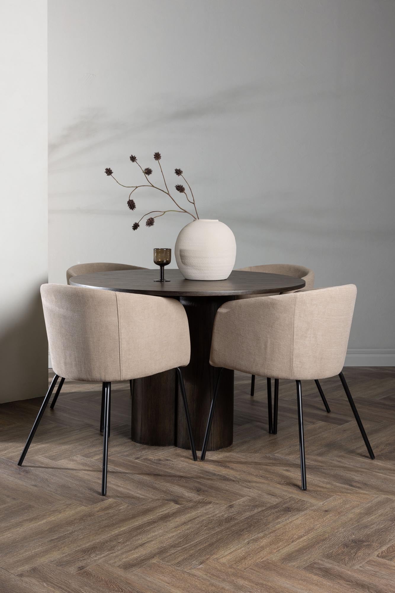 Stilvolles Olivia Esszimmer Set mit runden 110 cm Tisch und 4 komfortablen Berit Stühlen. Perfekt für gesellige Abende und elegante Anlässe.