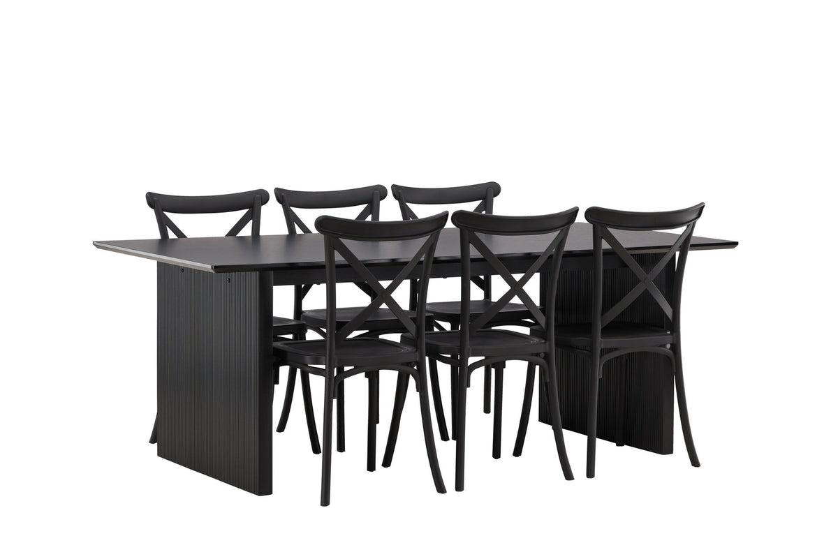 Esszimmerset aus rechteckigem MDF-Tisch in Rauchschwarz mit sechs Limhamn-Stühlen, beiger Samtbezug, muschelförmige Rückenlehne, schwarze Metallbeine.