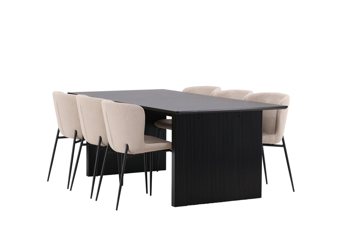Esszimmerset aus rechteckigem MDF-Tisch in Rauchschwarz mit sechs Limhamn-Stühlen, beiger Samtbezug, muschelförmige Rückenlehne, schwarze Metallbeine.