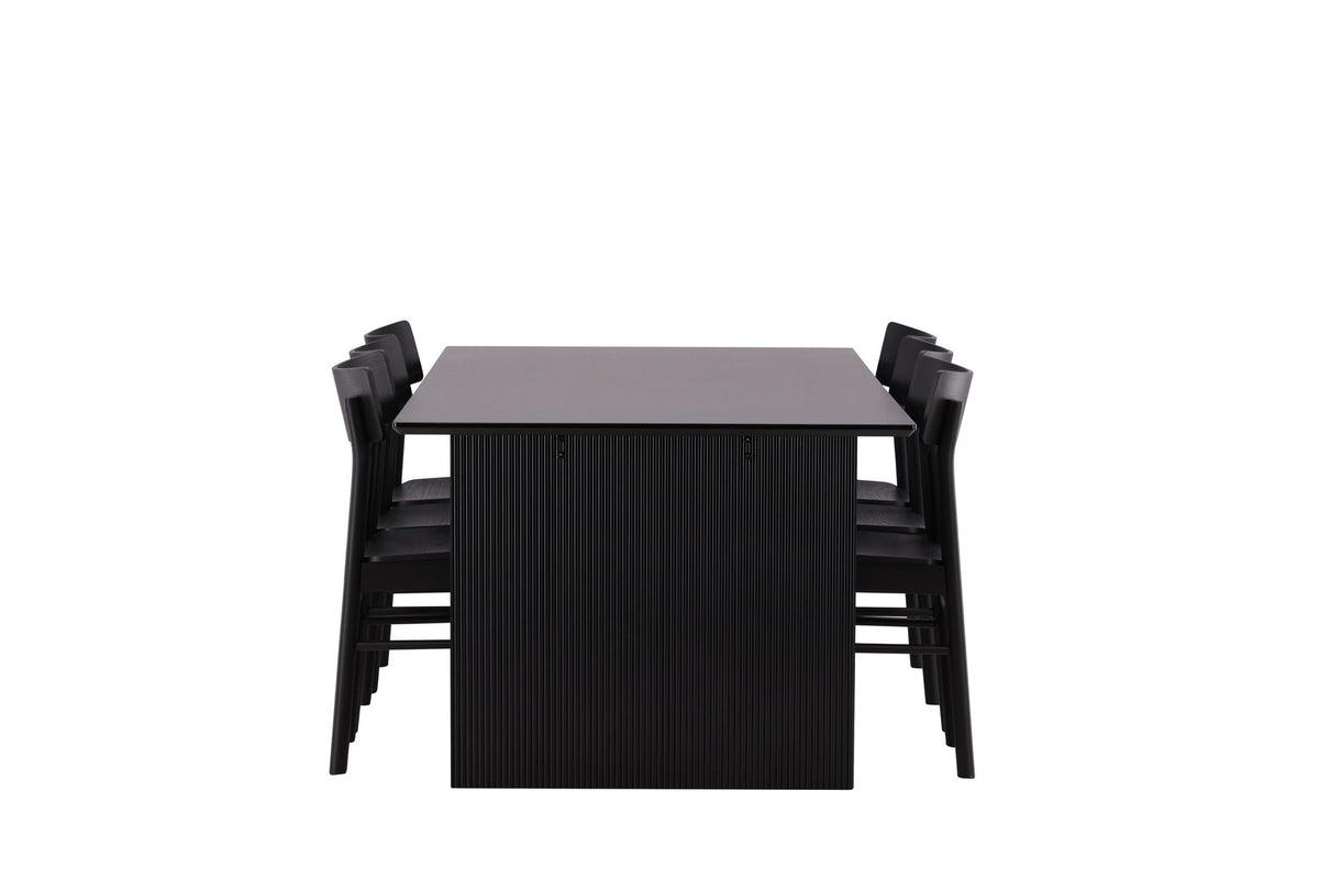 Esszimmerset aus rechteckigem MDF-Tisch in Rauchschwarz mit sechs Limhamn-Stühlen, beiger Samtbezug, muschelförmige Rückenlehne, schwarze Metallbeine.