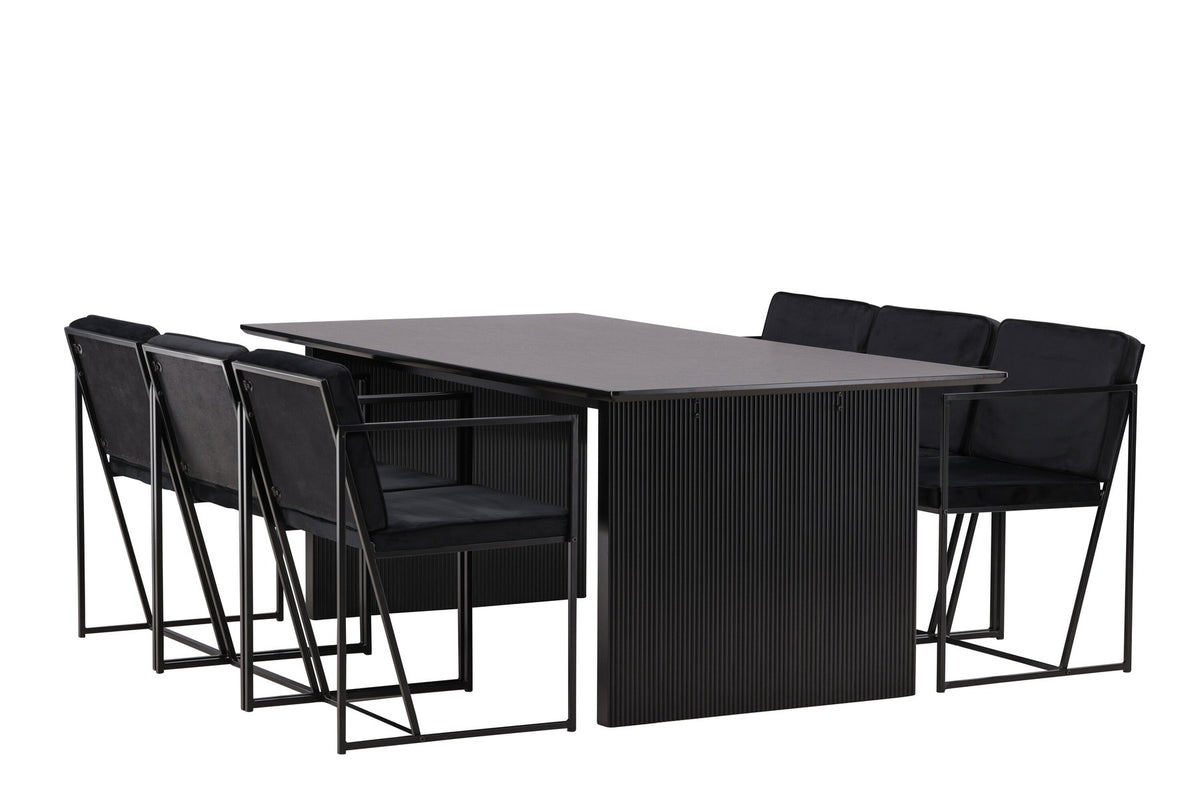 Esszimmerset aus rechteckigem MDF-Tisch in Rauchschwarz mit sechs Limhamn-Stühlen, beiger Samtbezug, muschelförmige Rückenlehne, schwarze Metallbeine.