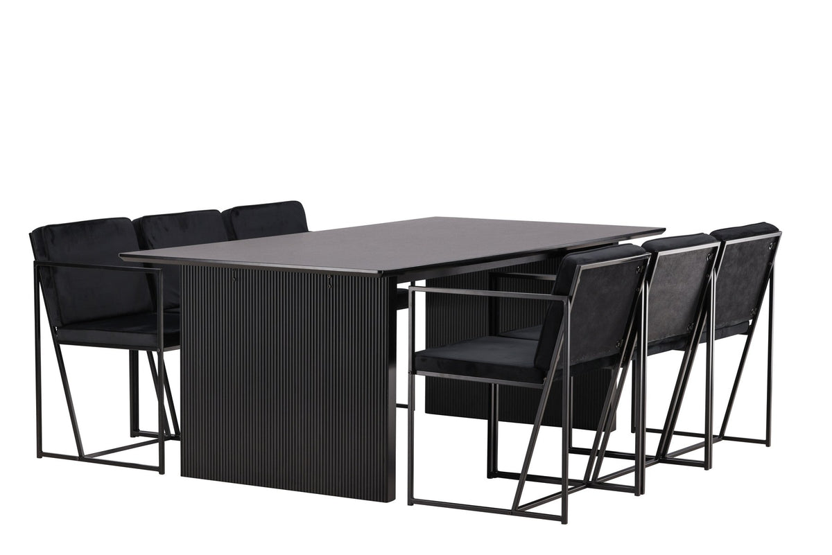 Esszimmerset aus rechteckigem MDF-Tisch in Rauchschwarz mit sechs Limhamn-Stühlen, beiger Samtbezug, muschelförmige Rückenlehne, schwarze Metallbeine.