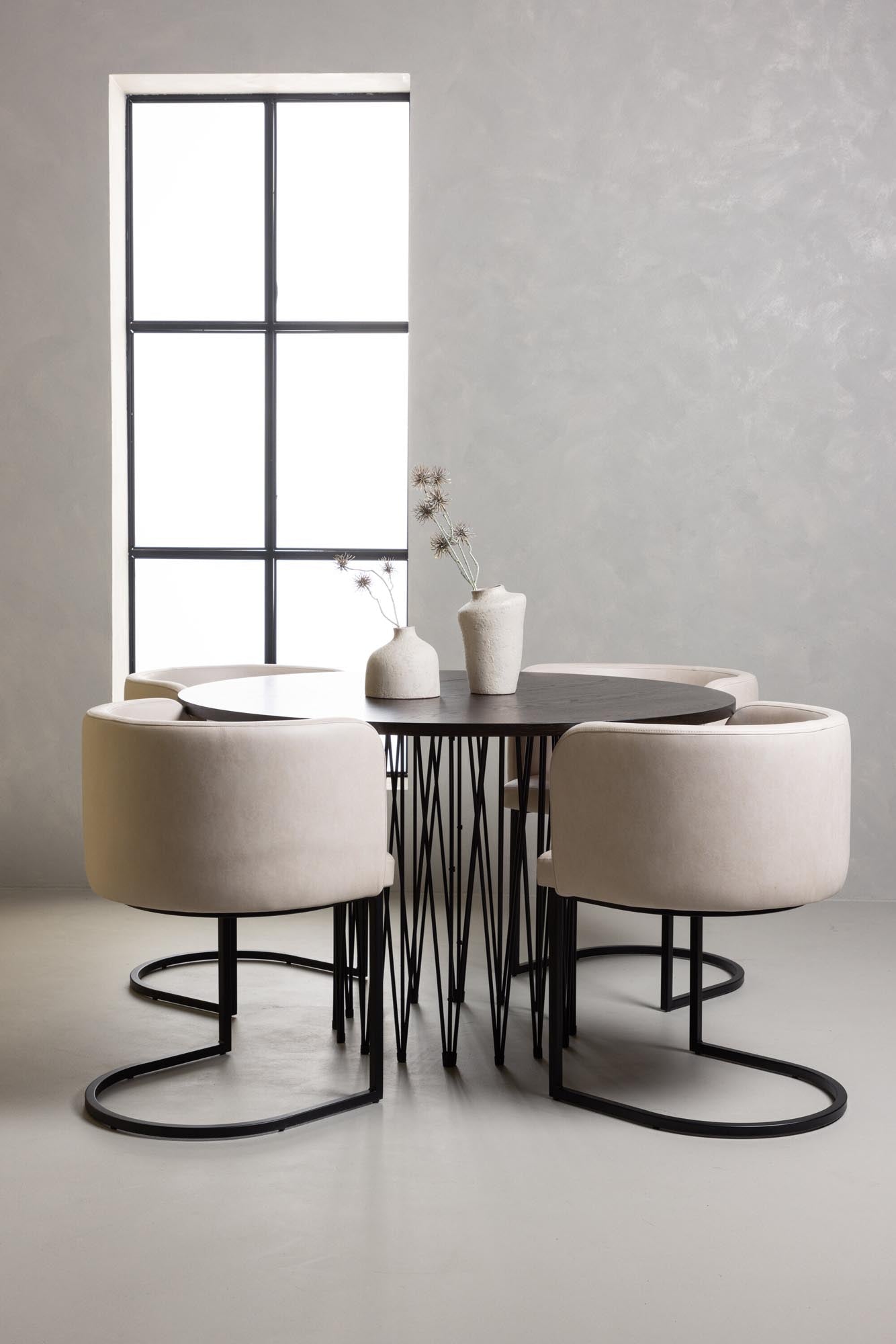 Stilvolles Esszimmerset mit runder Tischplatte aus MDF und eleganter Metallbasis. Bequeme, gepolsterte Stühle für gemütliche Essmomente.