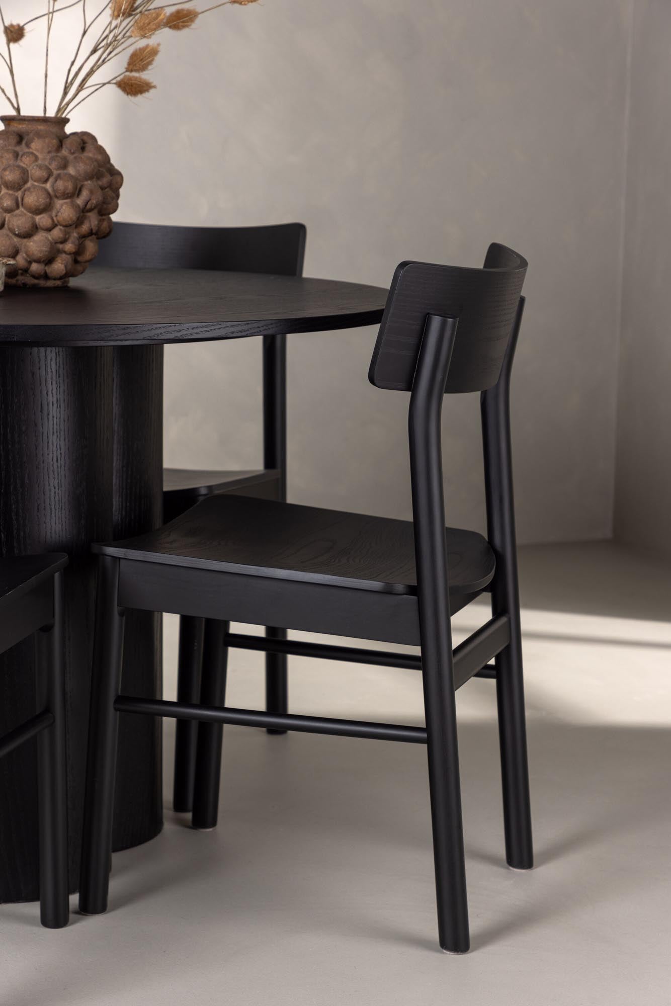 Entdecken Sie das elegante Olivia Esszimmer Set von Venture Home: runder Tisch (⌀110cm) aus hochwertigem MDF und 4 stilvolle Montros Stühle aus robustem Birkenholz.