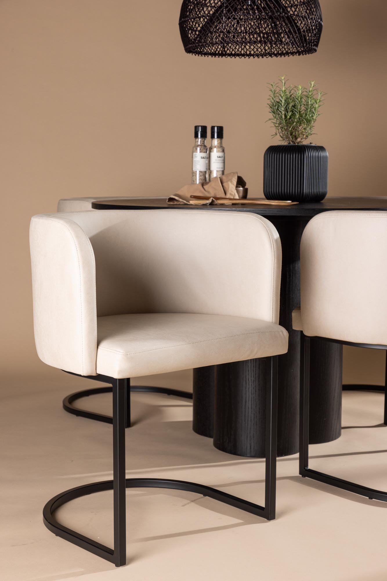 Stilvolles Olivia Esszimmer Set mit runden Tisch (⌀110cm) und 4 bequemen Stühlen. Perfekt für gesellige Momente und modernes Wohnen.